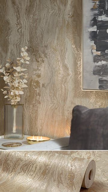 Marble-effect wallpaper wrapping a small bathroom with white fixtures and warm metallic accents.