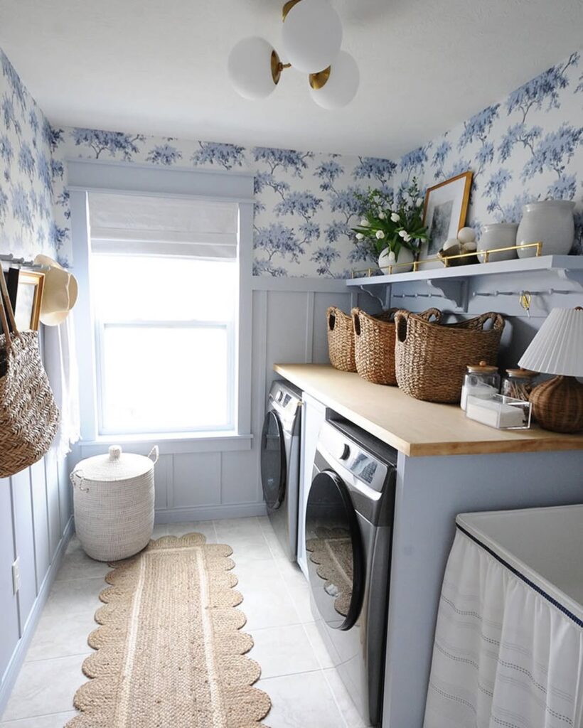 toile inspired charm in a breezy blue wallpaper