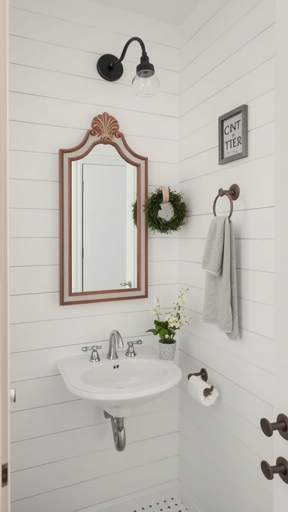 Small bathroom with shiplap walls, ornate mirror, light fixture, and decorative elements