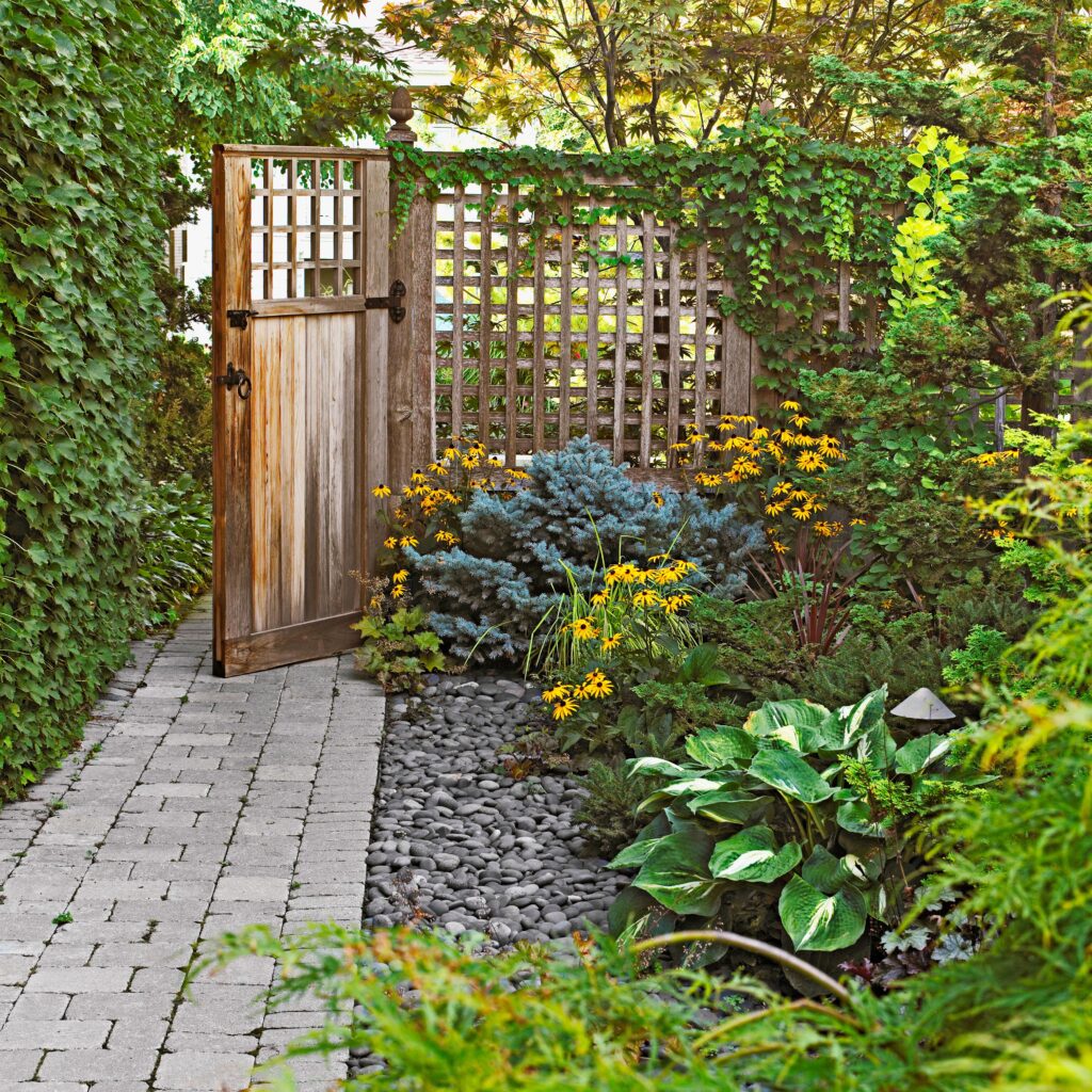 15 Small Back Garden Ideas to Transform Your Outdoor Space bhg garden lattice fence 2b3lwndhky9bpxjl vrvrk df2bab5f5ab341178a0aae7e67a4270d