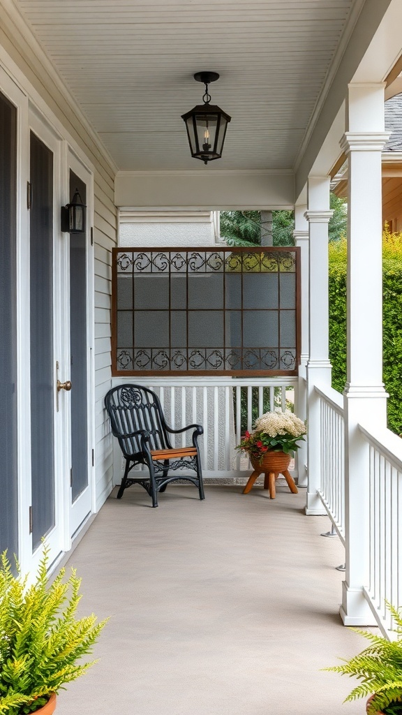 A back porch featuring a decorative privacy screen, a chair, and potted plants.
