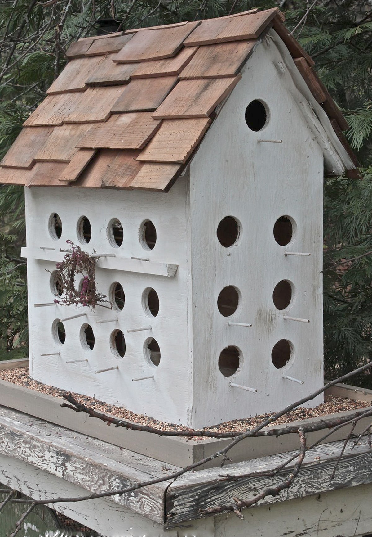 Creative birdhouse made from an old leather work boot.