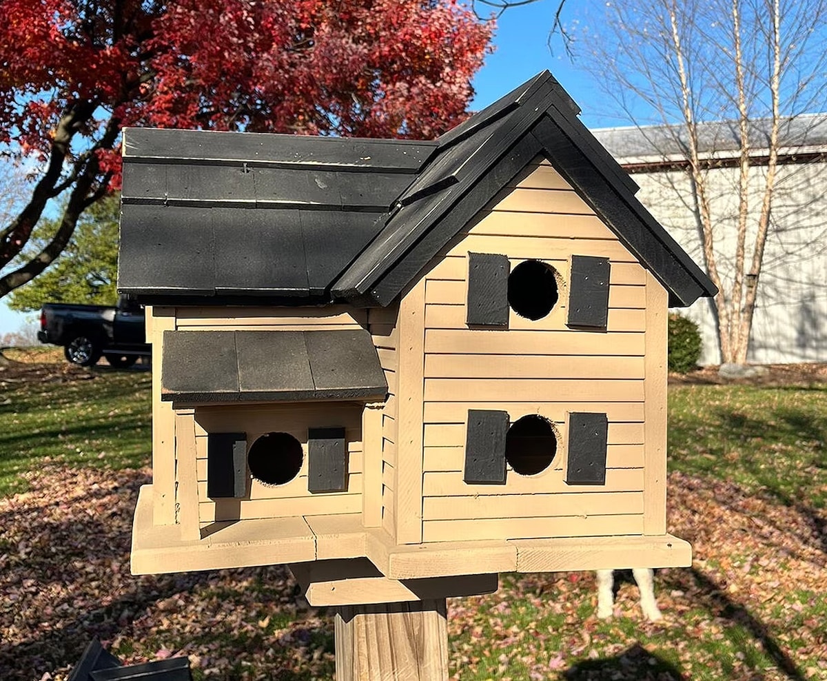 Birdhouse made from a reclaimed wine crate featuring original vineyard branding.