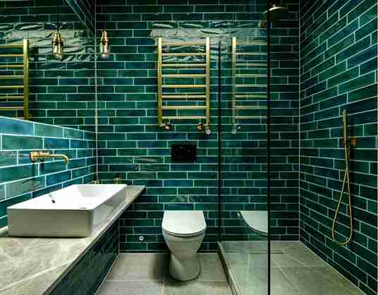 I Didn’t Expect Green Tile Bathrooms to Look This Stylish