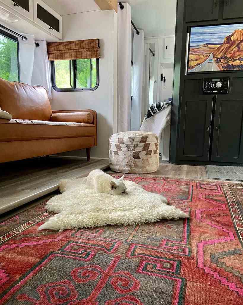 Elegant RV living area with fireplace