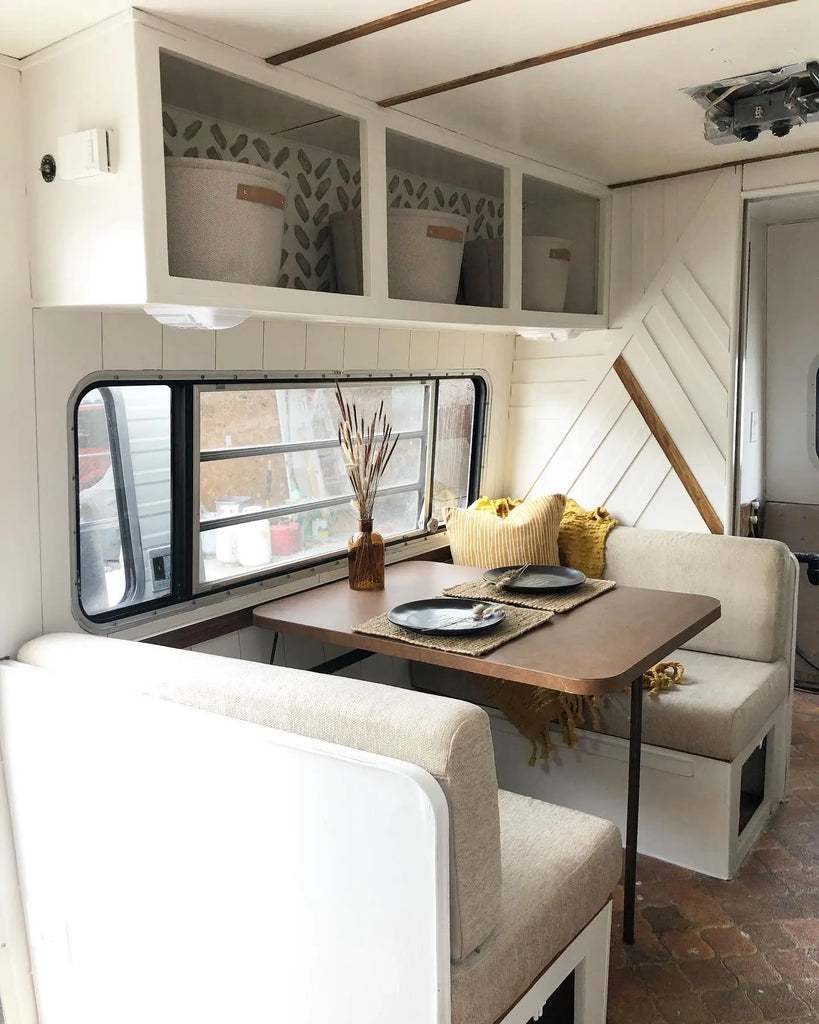 Sweet RV dinette with patterned cabinets