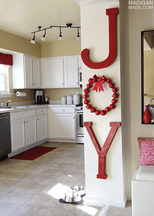 White Snowflake Wreath with Red Bow